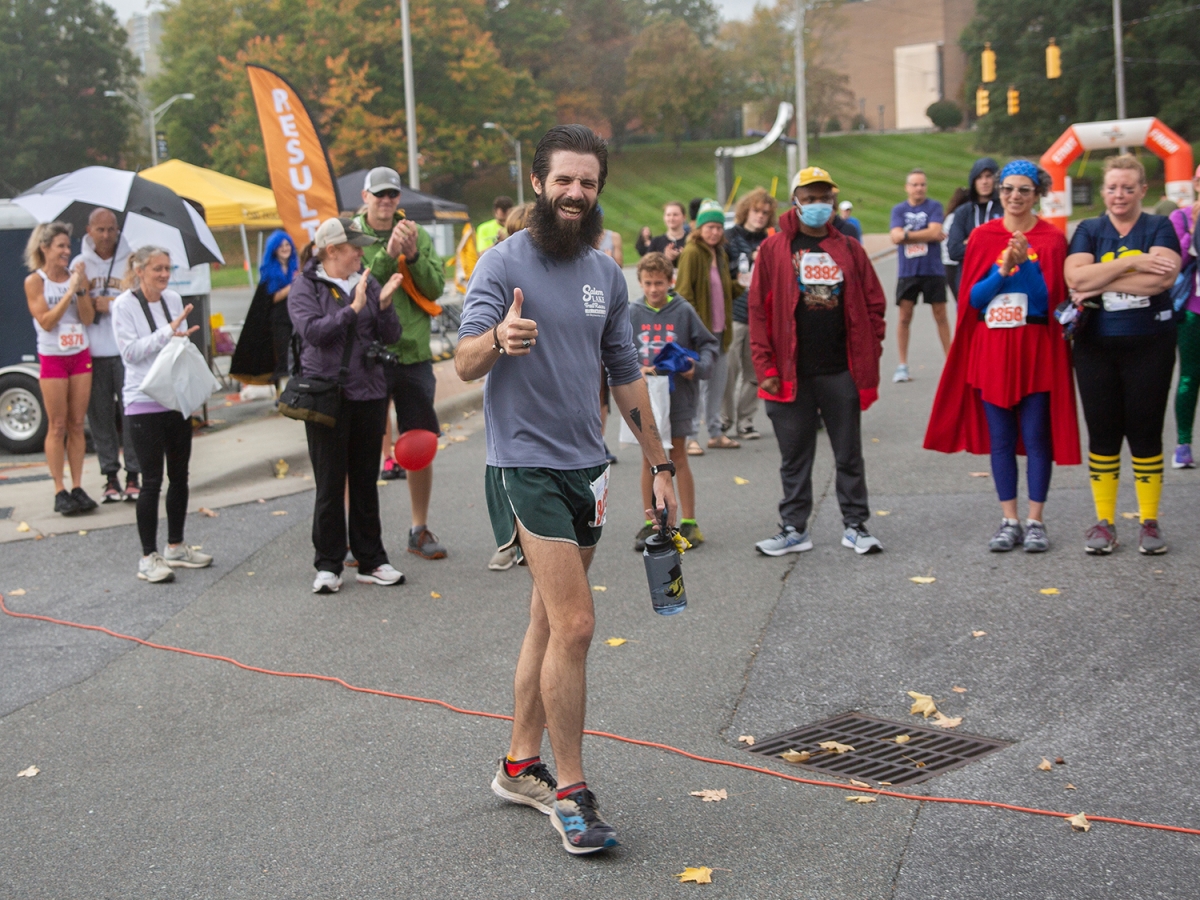 Second place runner gives thumbs up